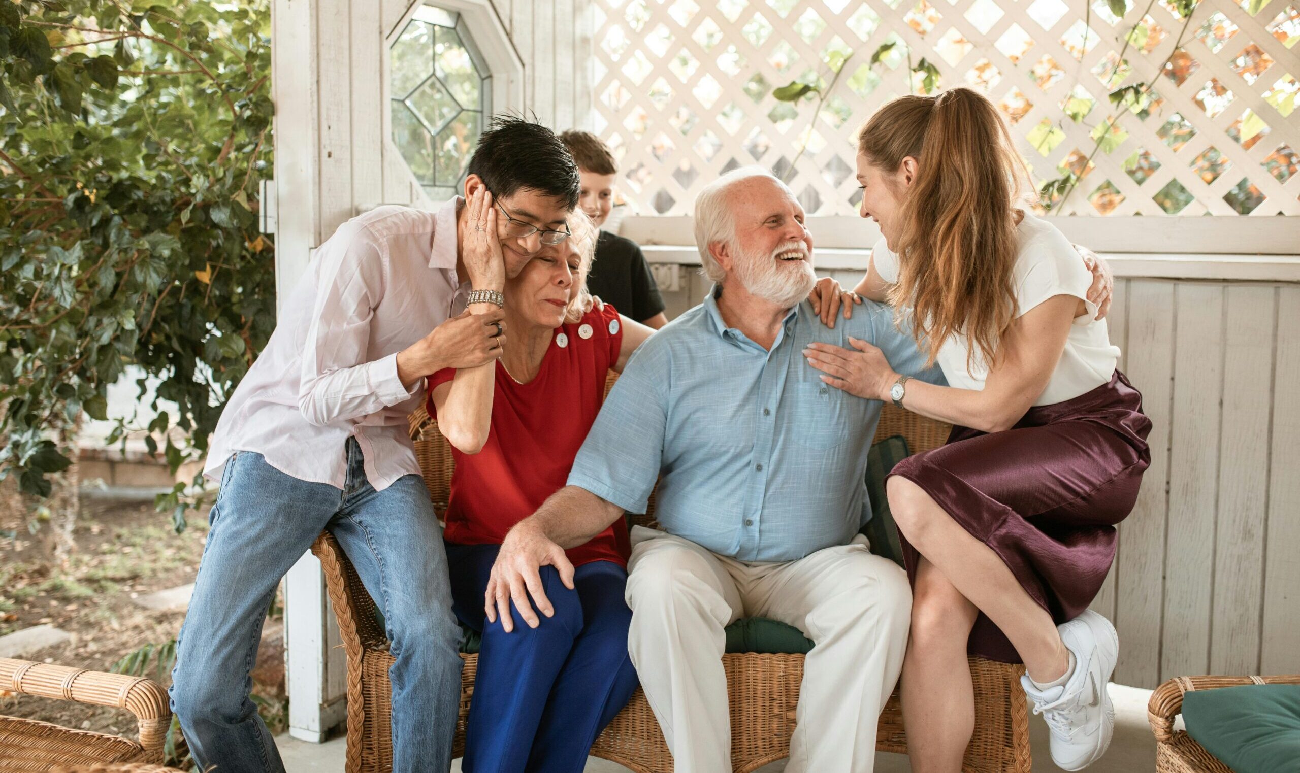 Cheerful family spending quality time together outdoors, showcasing love and connection.